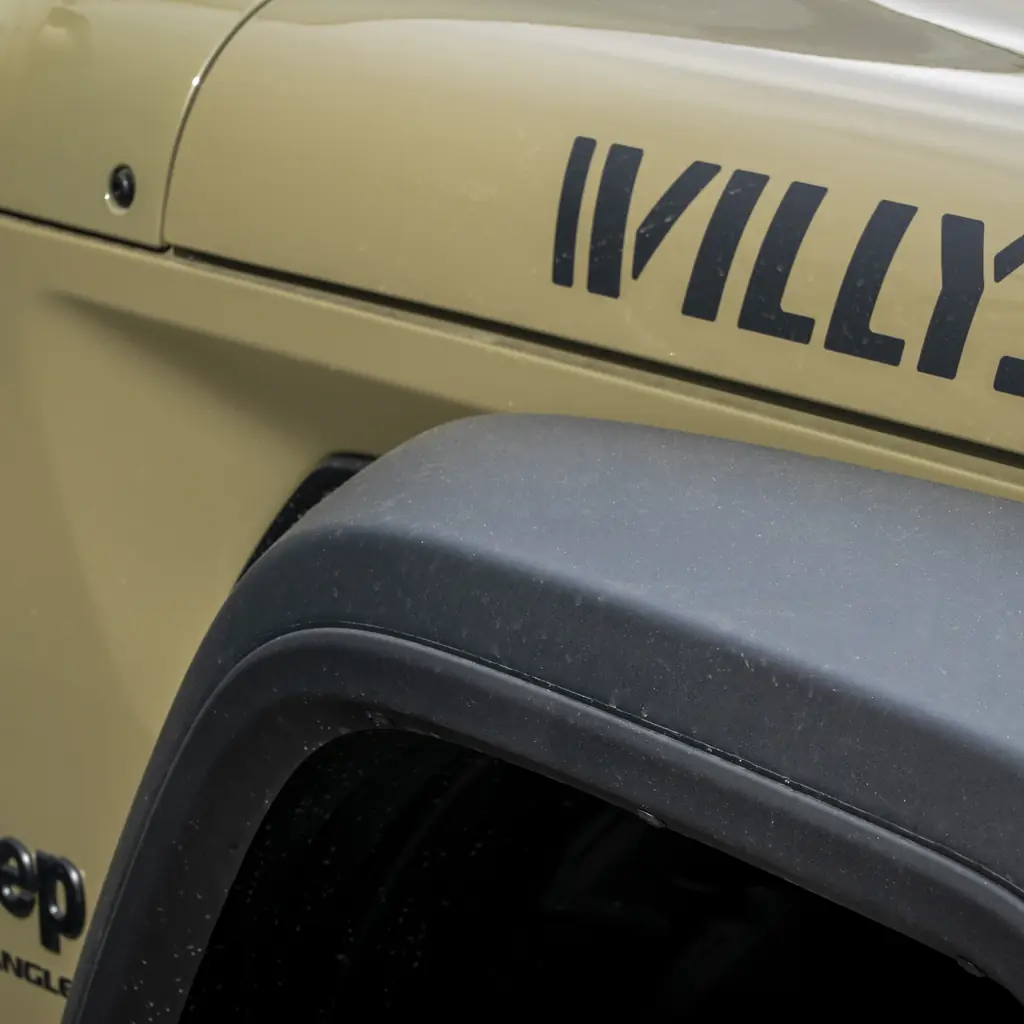 Willys lettering on the hood of a Jeep Wrangler.