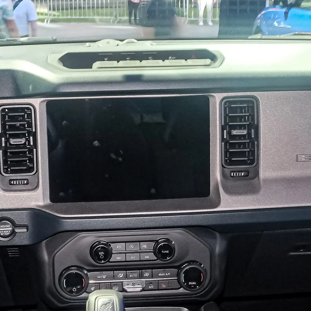 Center touchscreen and dashboard controls of a full-size Ford Bronco.