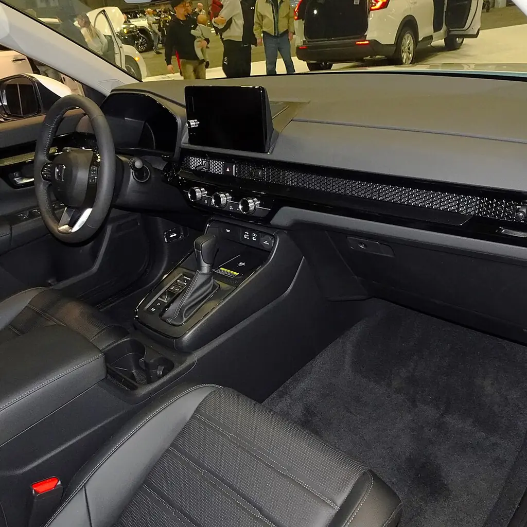 Dashboard and front seats of a 2024 Honda CR-V EX-L AWD.
