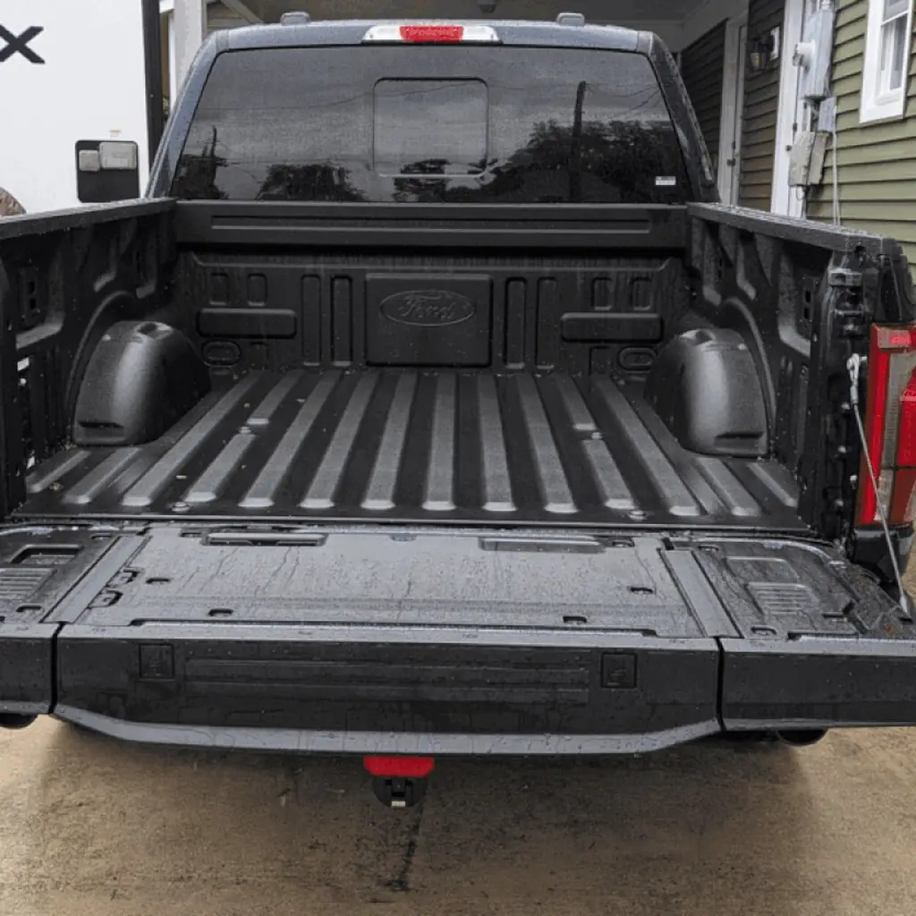 The tailgate lowered on a 2025 Ford F-150.