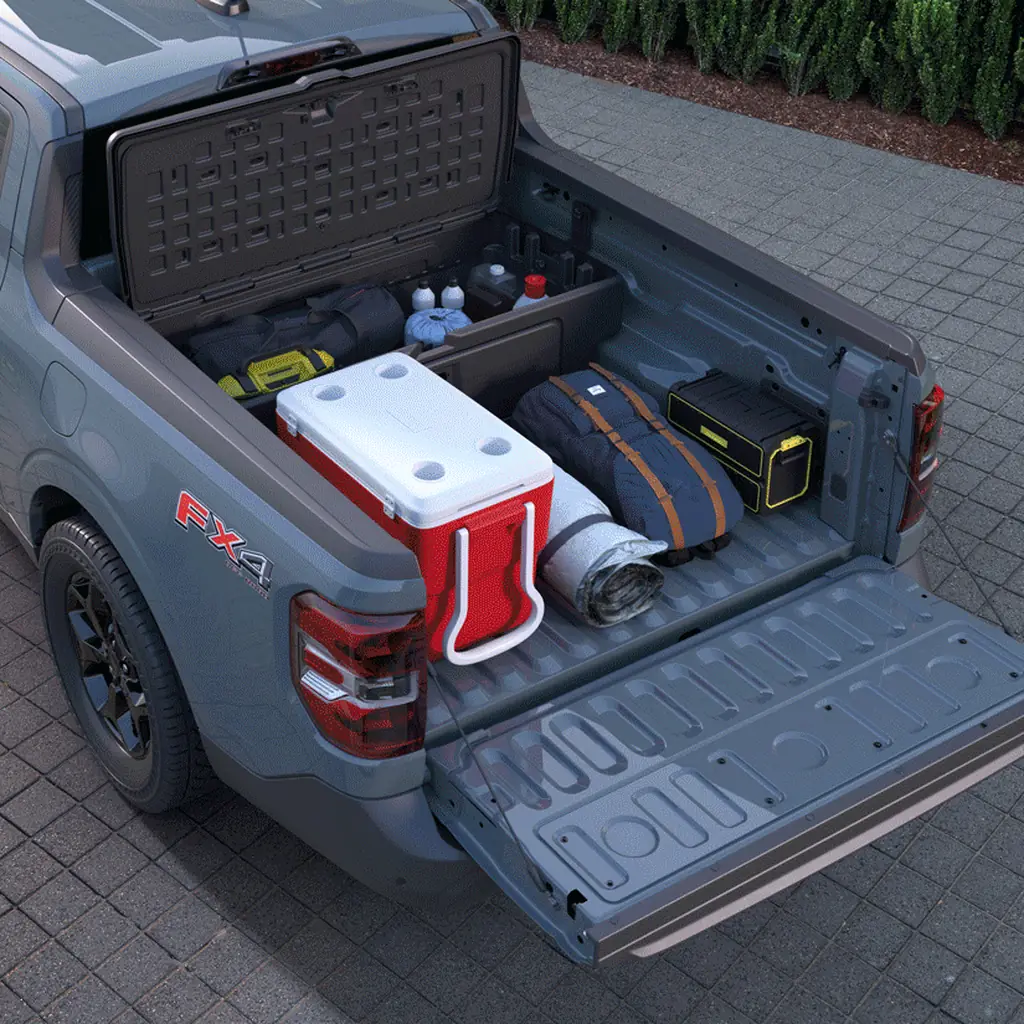 A Ford Maverick FLEXBED divided into separate cargo areas.