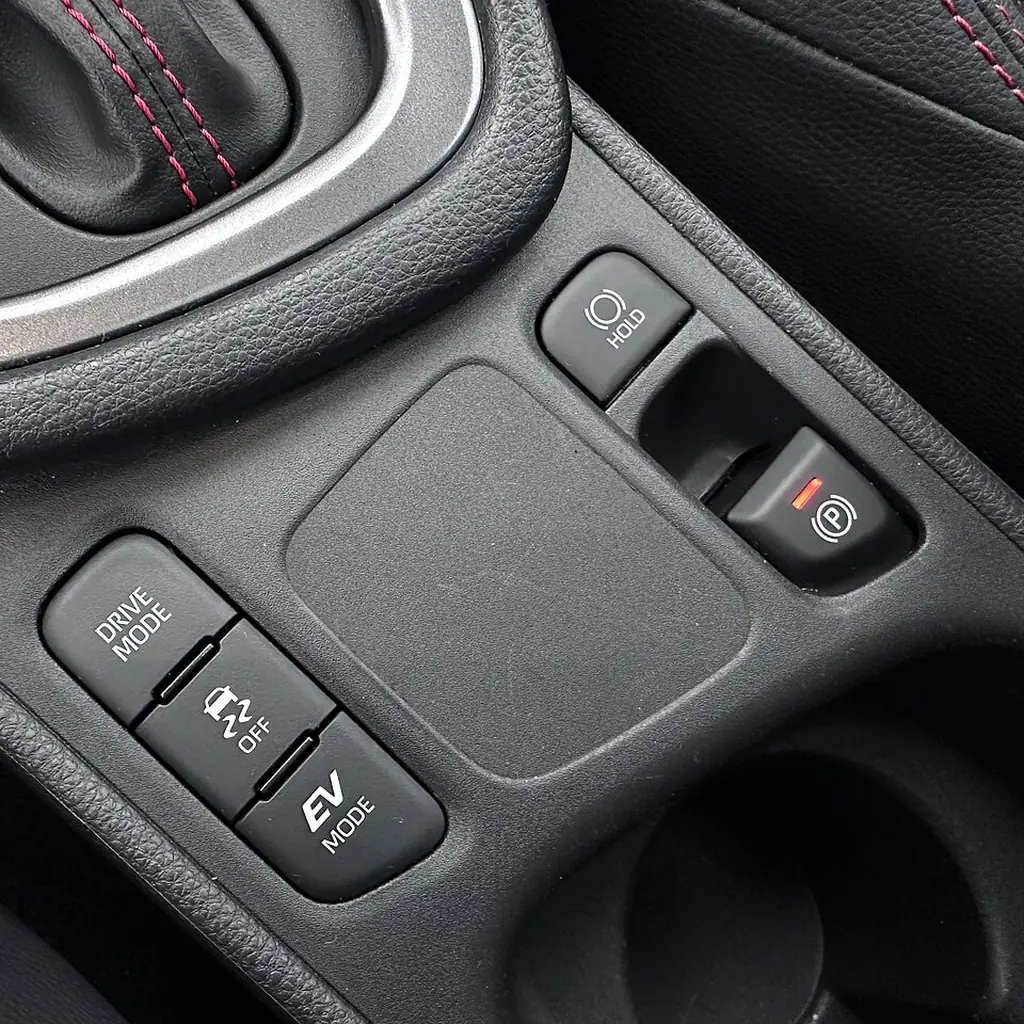 Auto Hold and electronic parking-brake controls in a Toyota Yaris Hybrid.