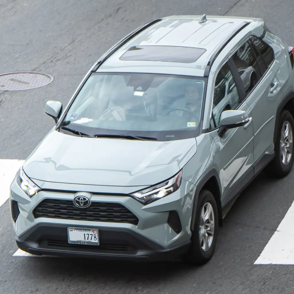Front quarter of a silver fifth-generation Toyota RAV4 on a US street.