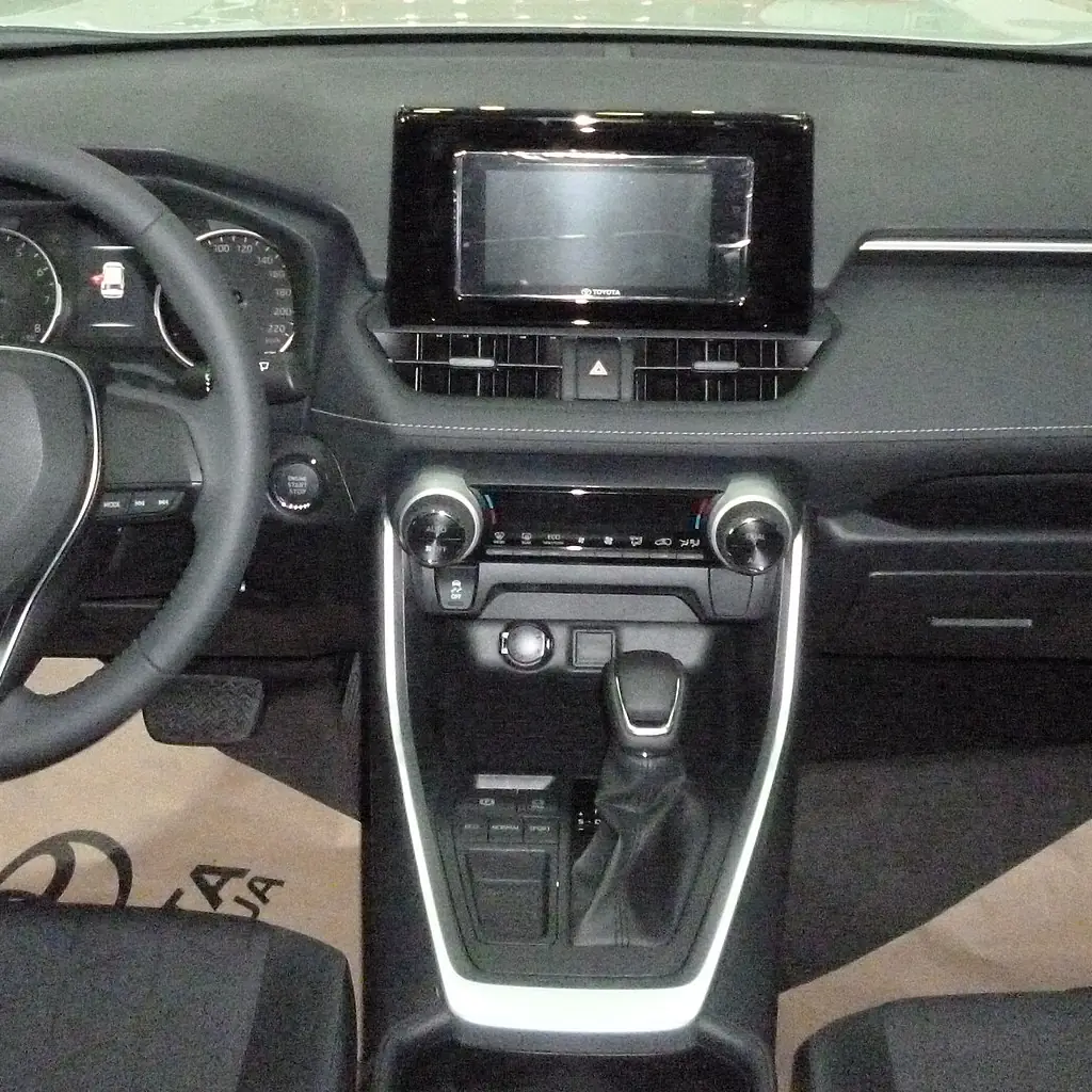 Shifter console and center controls of a 2019 Toyota RAV4 XLE.