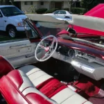 1966 Cadillac deVille convertible interior with a triangular vent pane