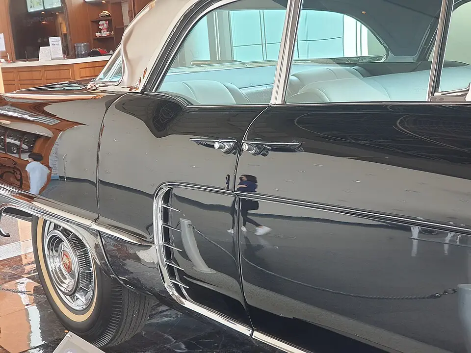 1957 Cadillac Eldorado Brougham with opposing door handles; doors are closed